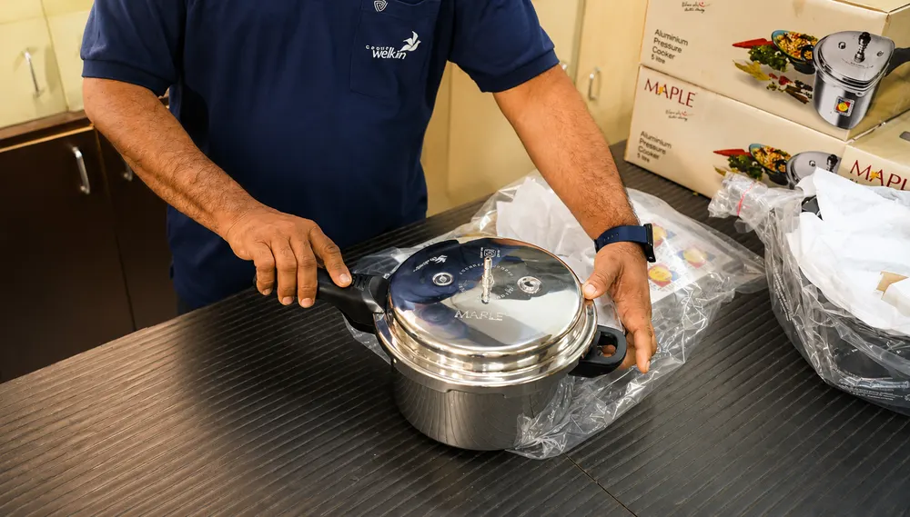 The team running a product quality check