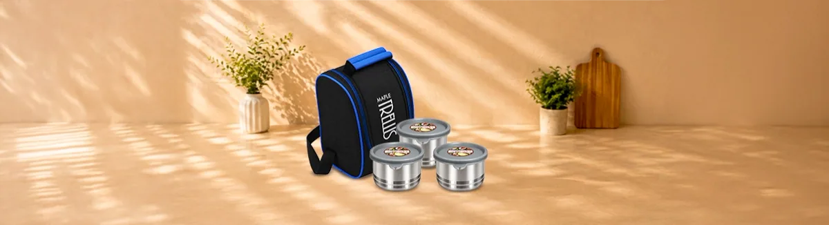 Black and blue insulated bag with three steel containers in front
