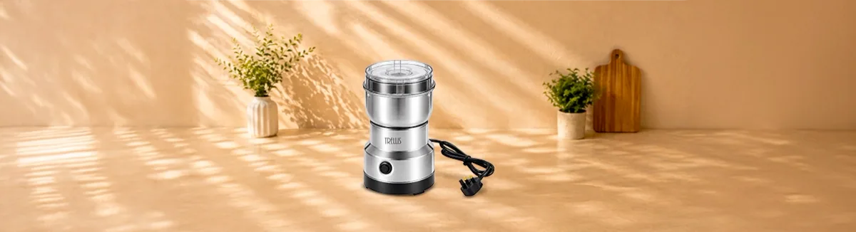 Compact steel grinder with a clear lid and a power cord